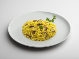 Risotto z szafranem i  maślakami